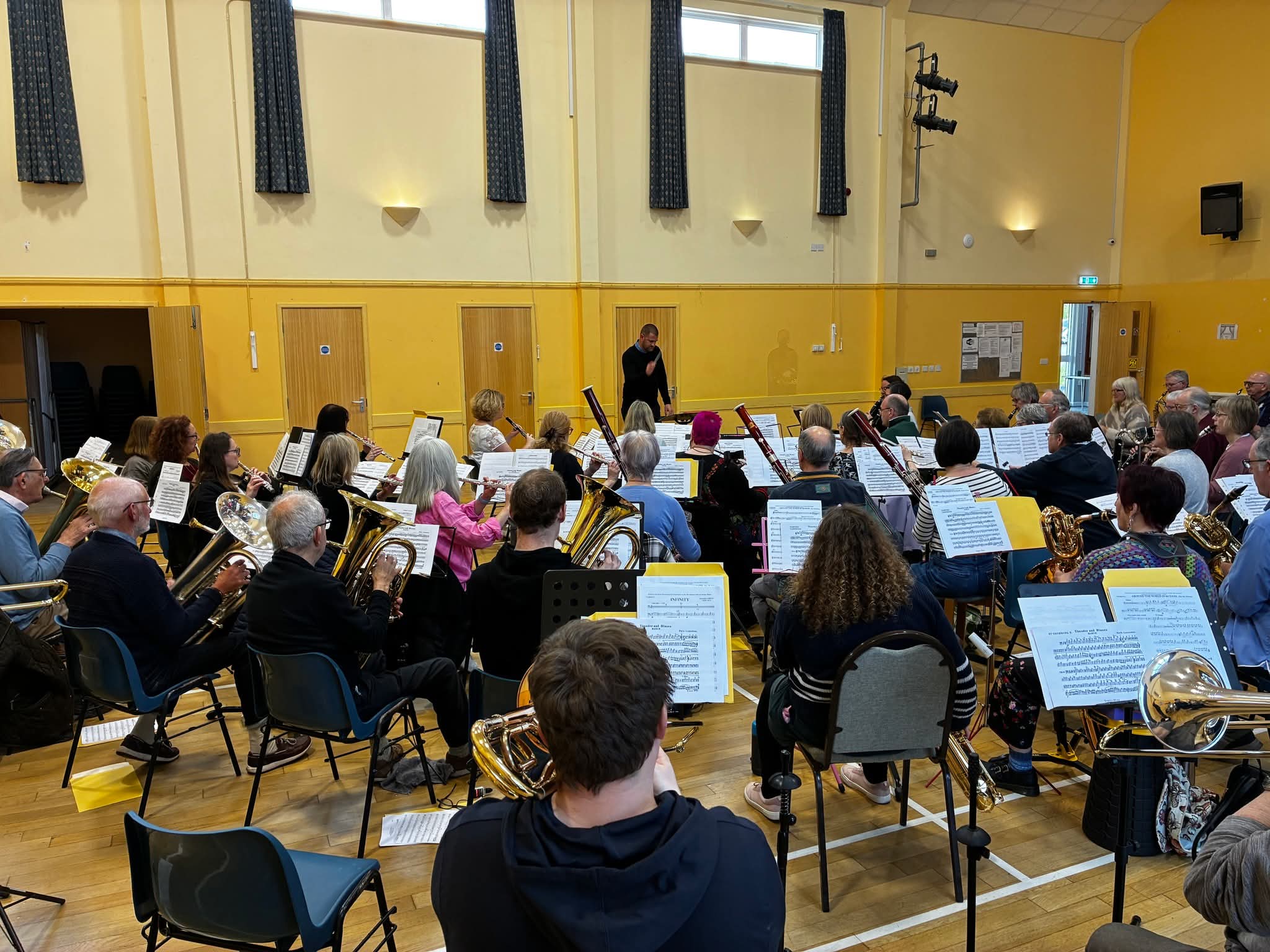 Image of a wind band.looking towards the conductor